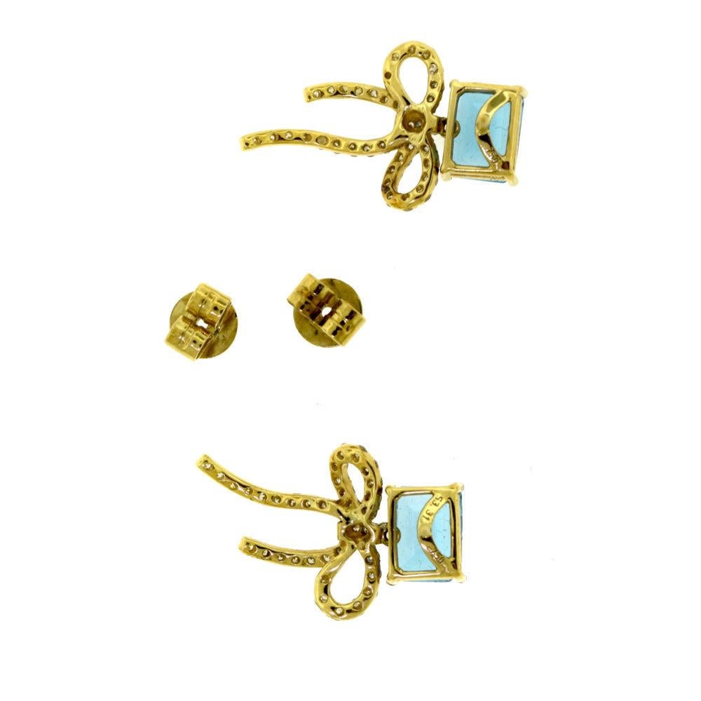 Orecchini a fiocco in oro giallo 18 carati con topazio blu e diamanti In condizioni buone in vendita a Miami, FL