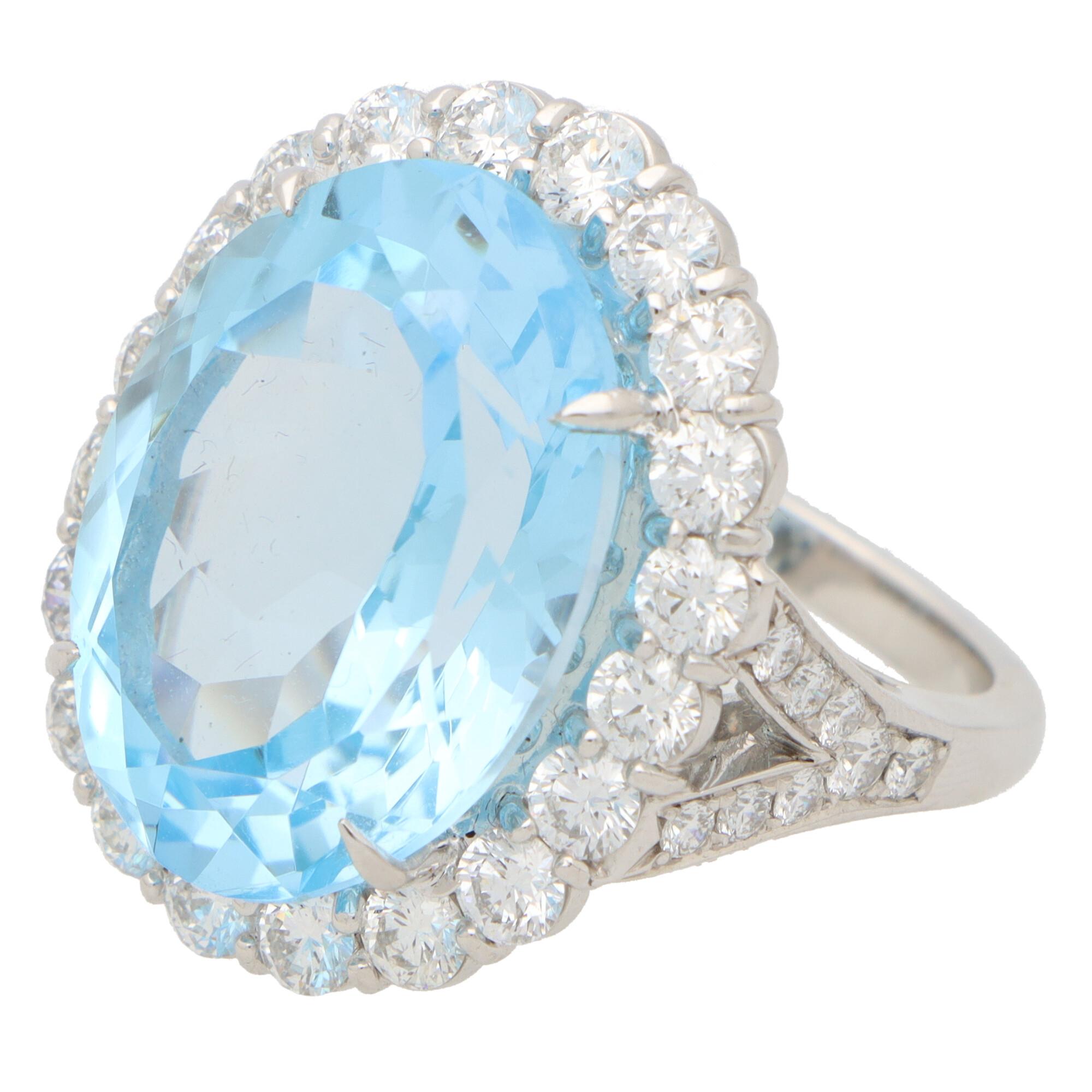 blue topaz and diamond cluster ring