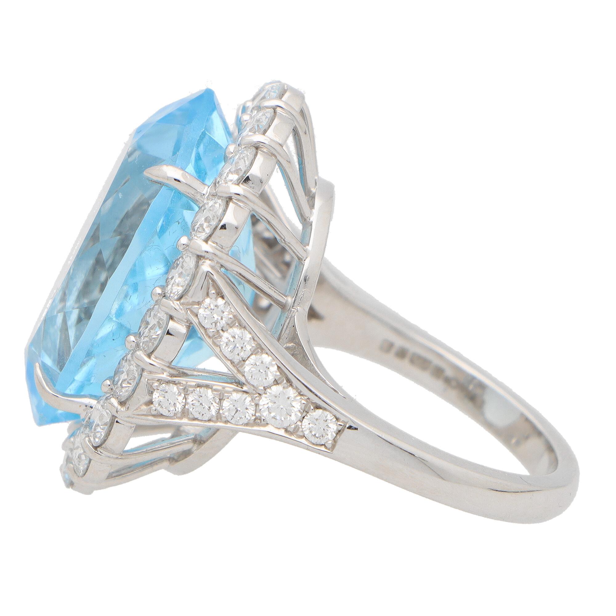 Oval Cut Blue Topaz and Diamond Cluster Cocktail Ring Set in Platinum