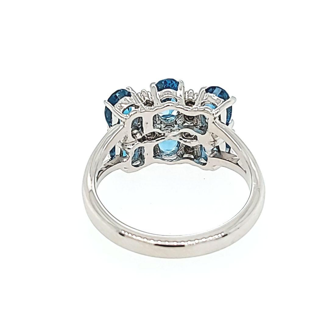 Women's or Men's Blue Topaz and Diamond Cluster Ring For Sale