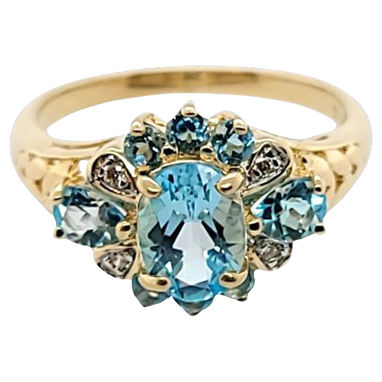 Blue Topaz and Diamond Cluster Ring in Yellow Gold For Sale