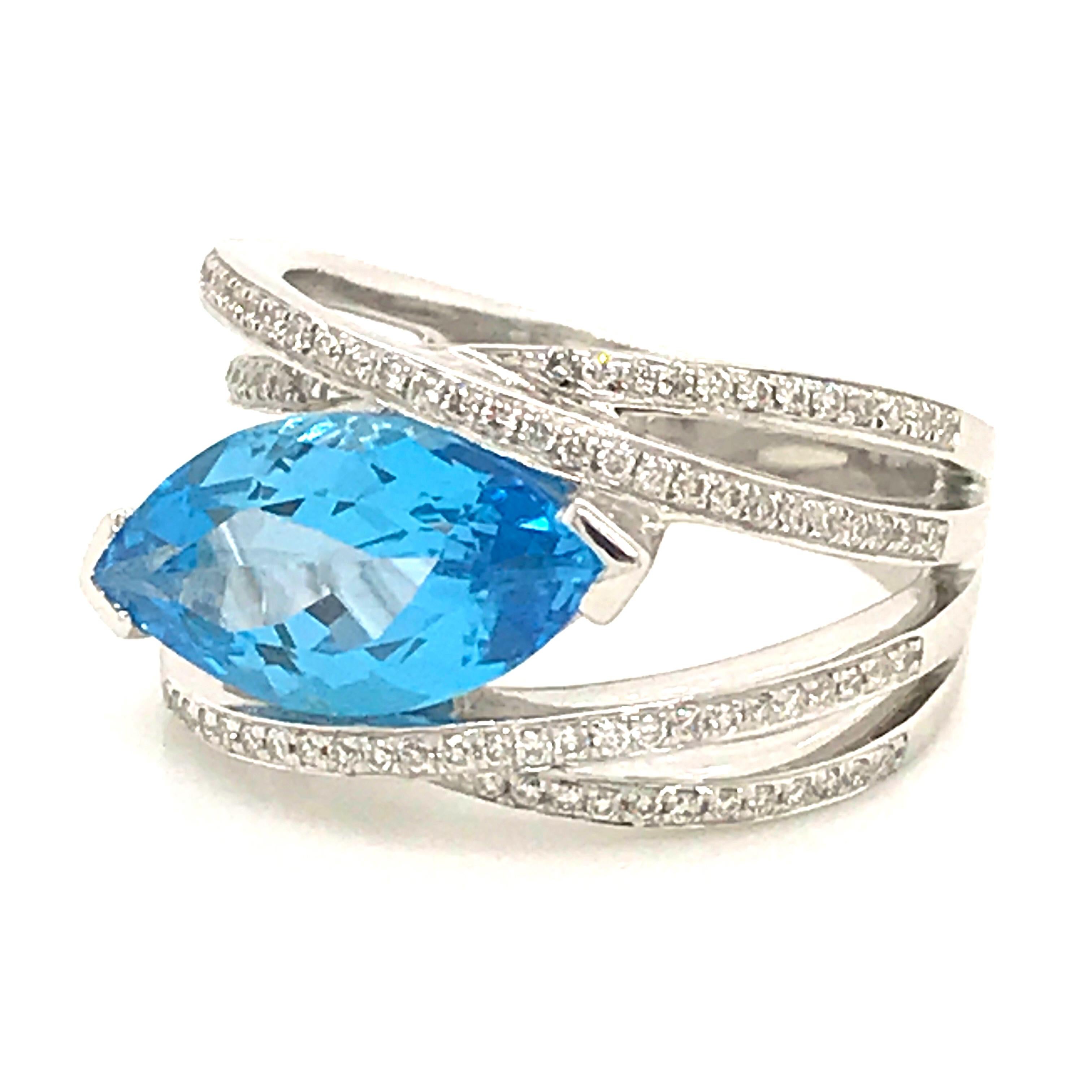 Blue Topaz and Diamond Color G -VS Marquise Shape Gold 18 Karat Fashion Ring 9