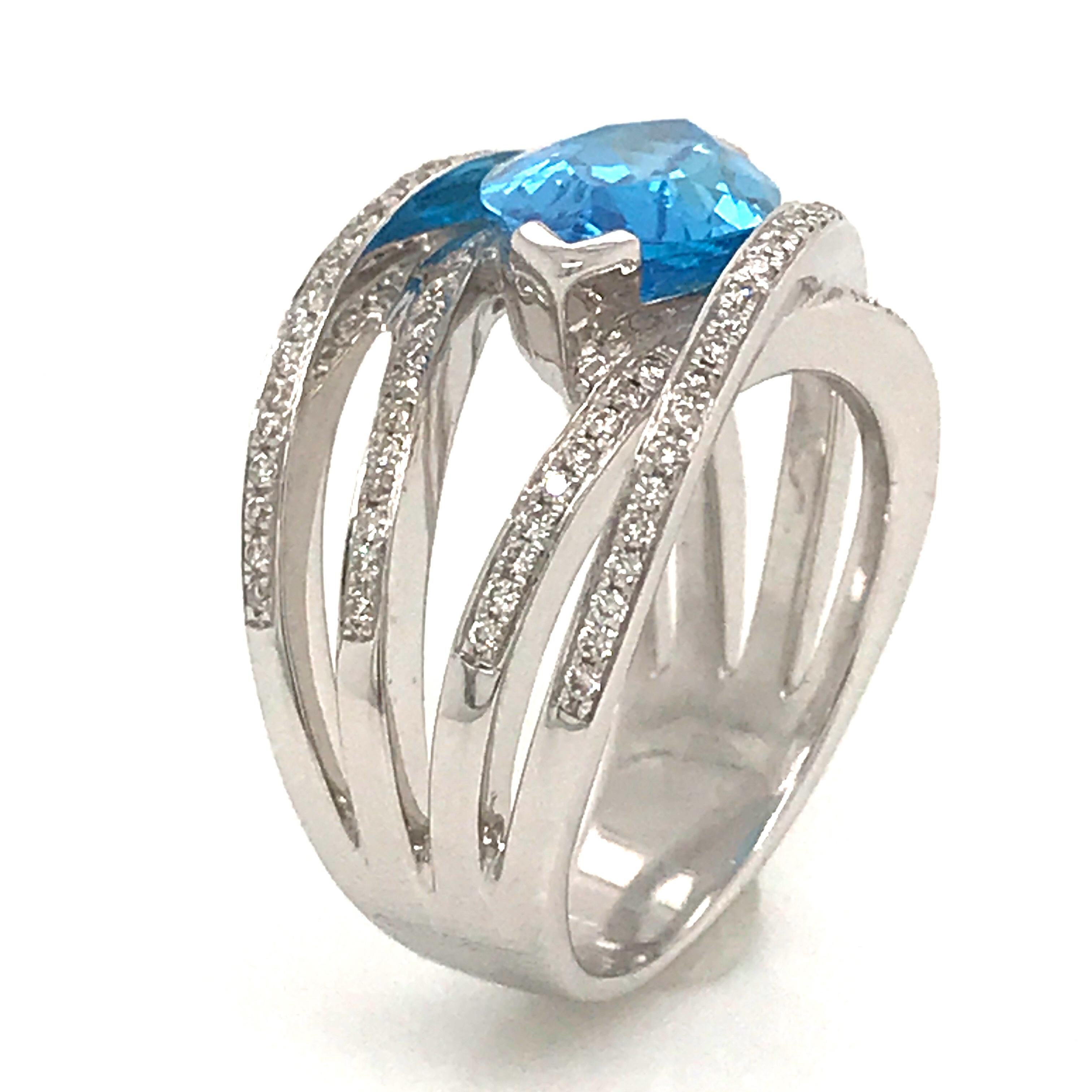 Marquise Cut Blue Topaz and Diamond Color G -VS Marquise Shape Gold 18 Karat Fashion Ring