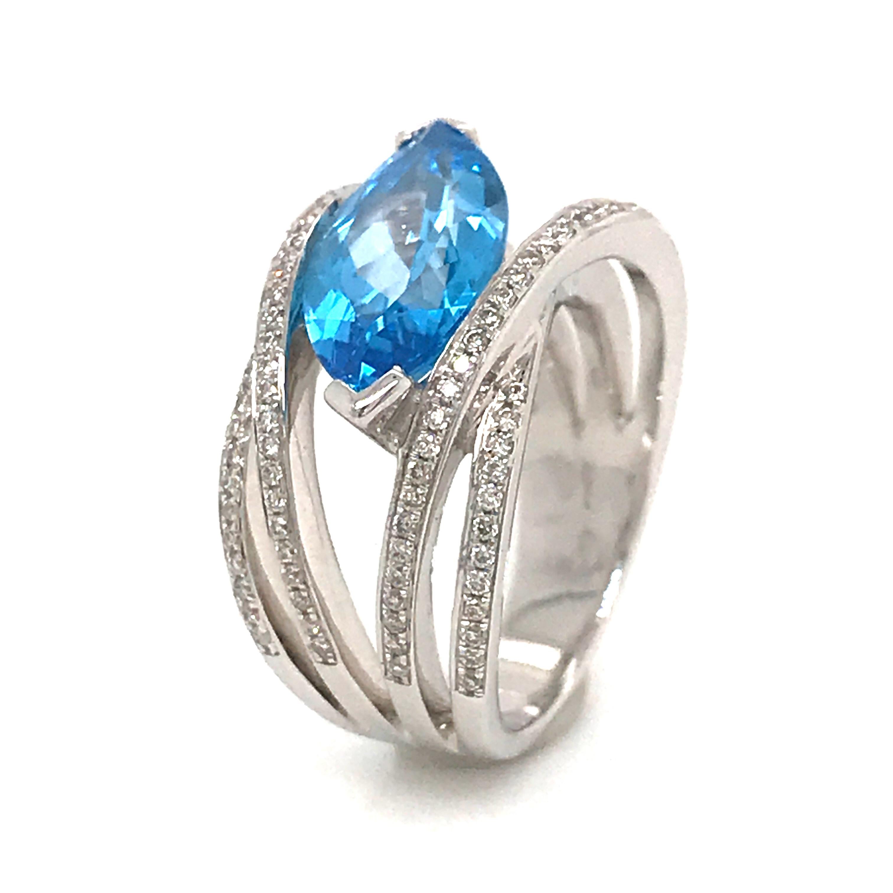 Women's Blue Topaz and Diamond Color G -VS Marquise Shape Gold 18 Karat Fashion Ring