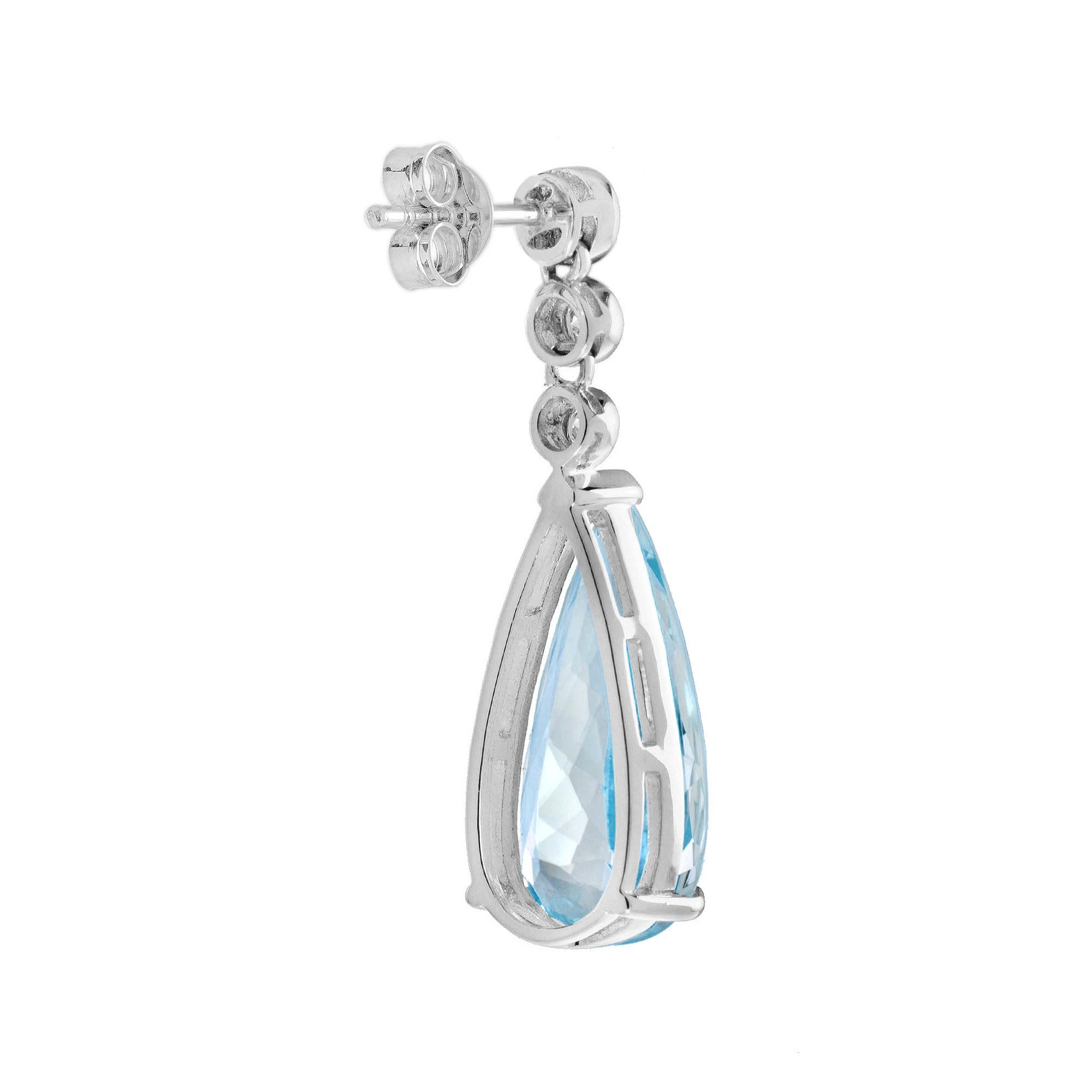 Pear Cut Blue Topaz and Diamond Drop Earrings in 14K White Gold For Sale