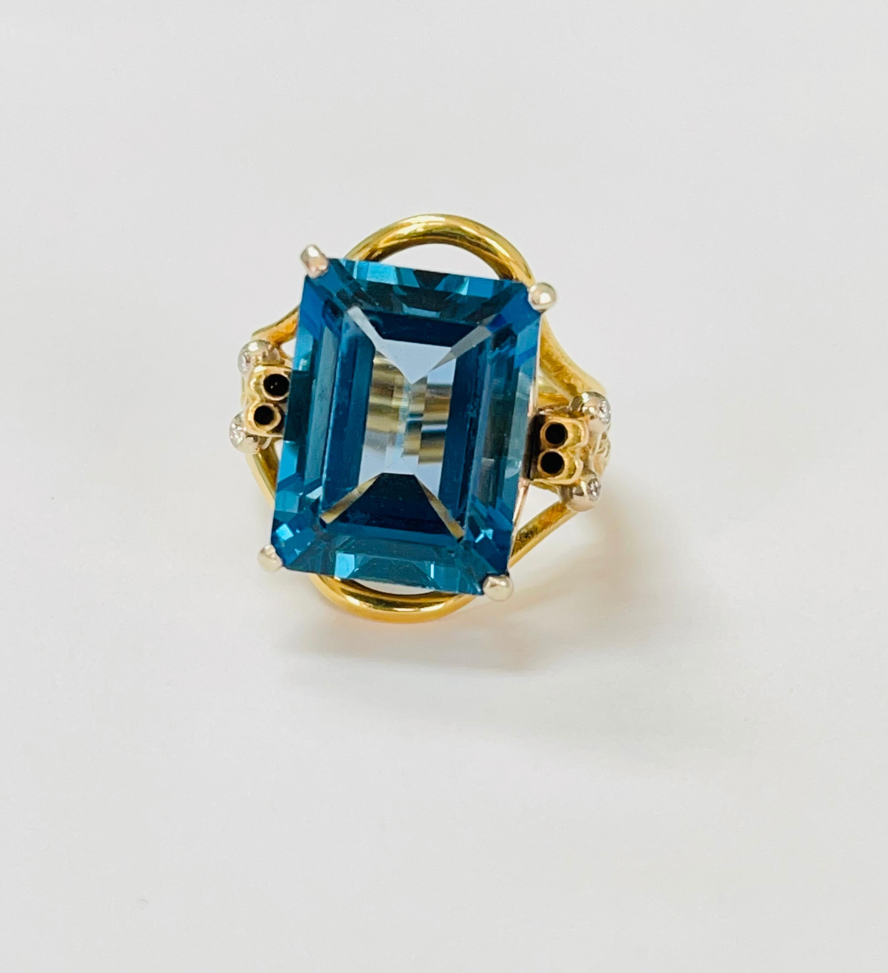 Contemporary Blue Topaz and Diamond Engagement Ring in Yellow Gold For Sale