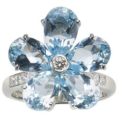 Blue Topaz and Diamond Flower Ring