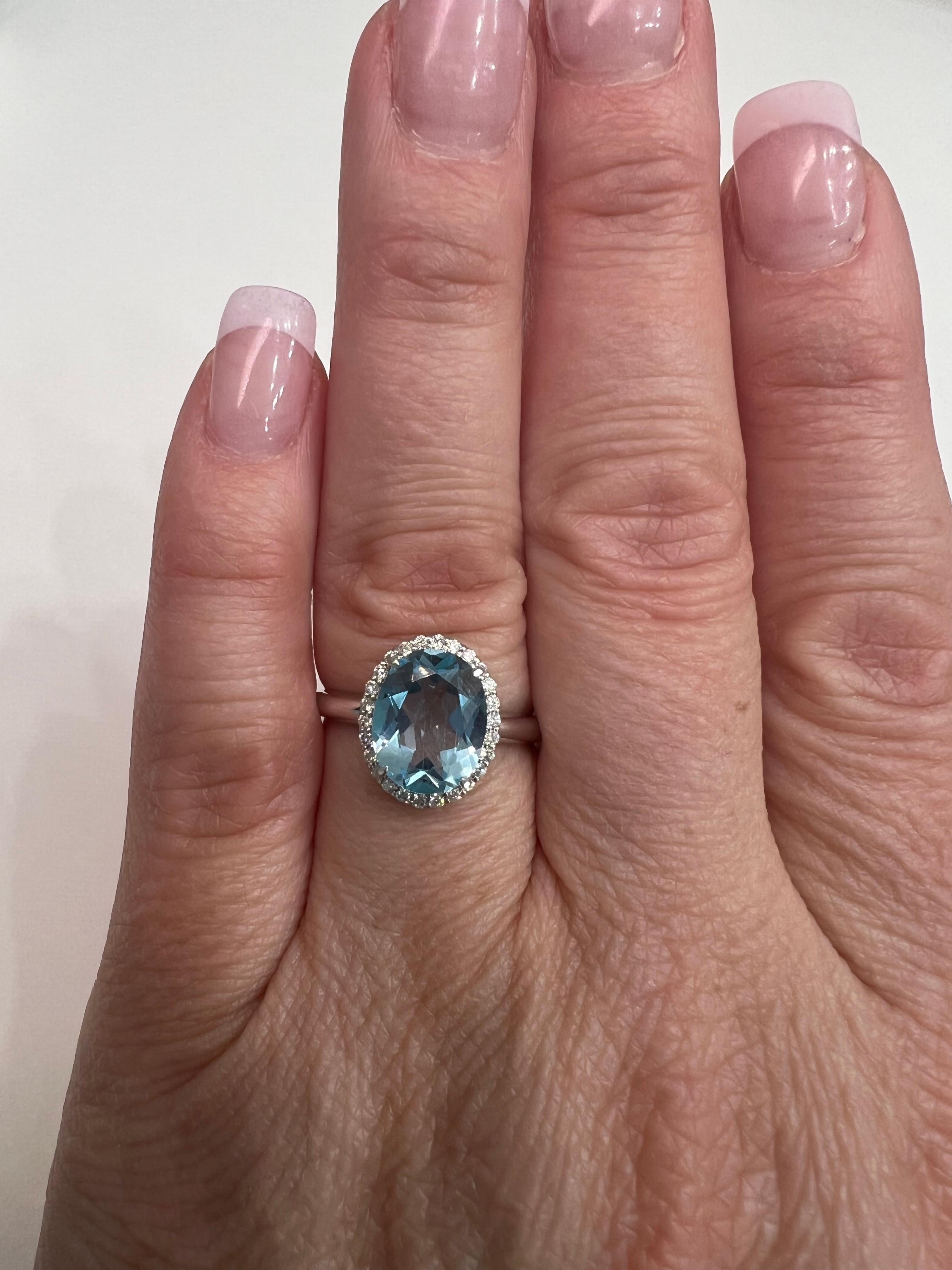 Brilliant Cut Blue Topaz and Diamond Halo Ring, 10k White Gold