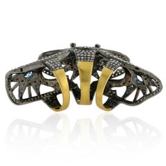 Blue Topaz and Diamond Knuckle Ring in Silver