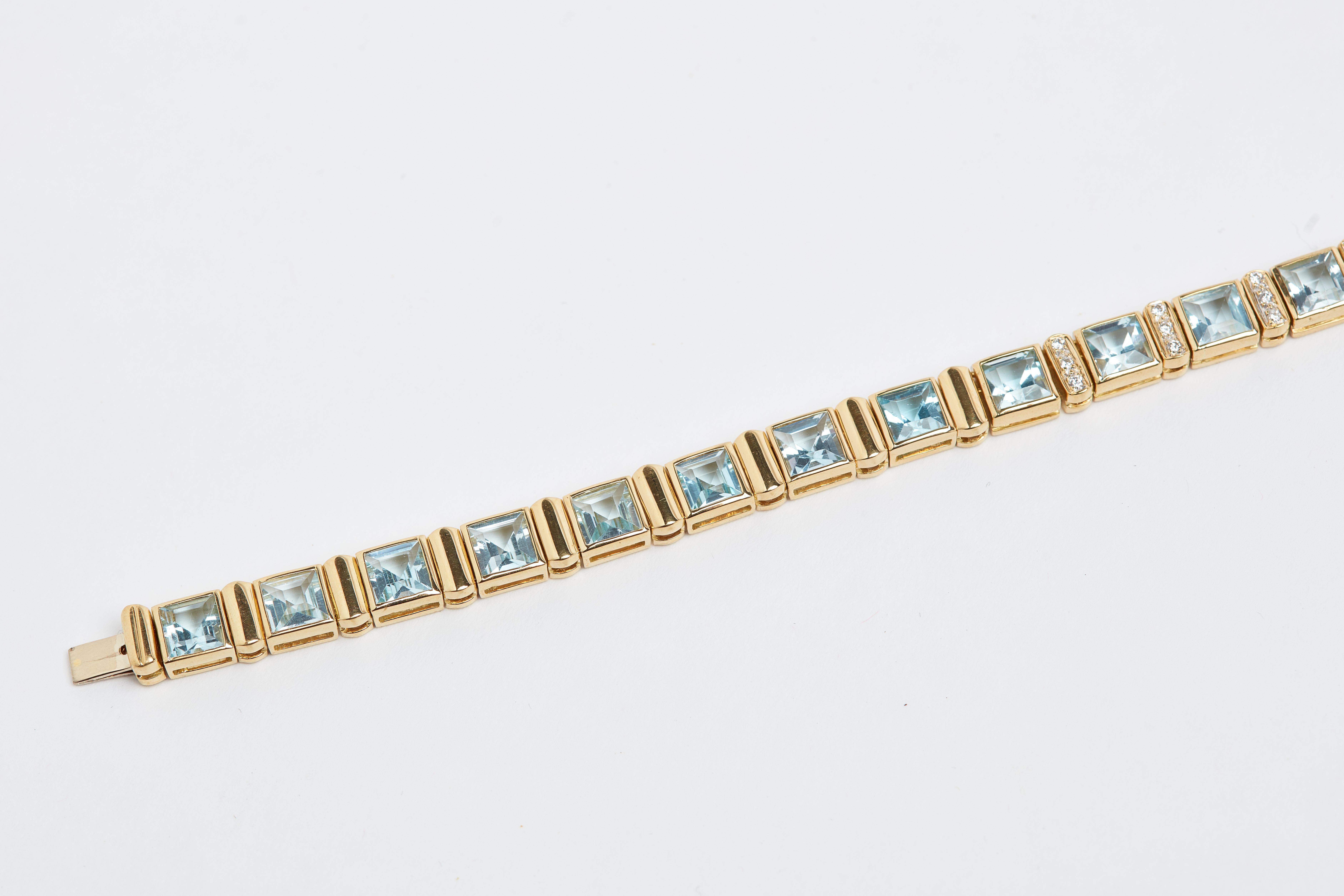 Blue Topaz and Diamond Necklace. 66 diamonds weighing aprox 1 carat total. 18k yellow gold. 16 inches long. 