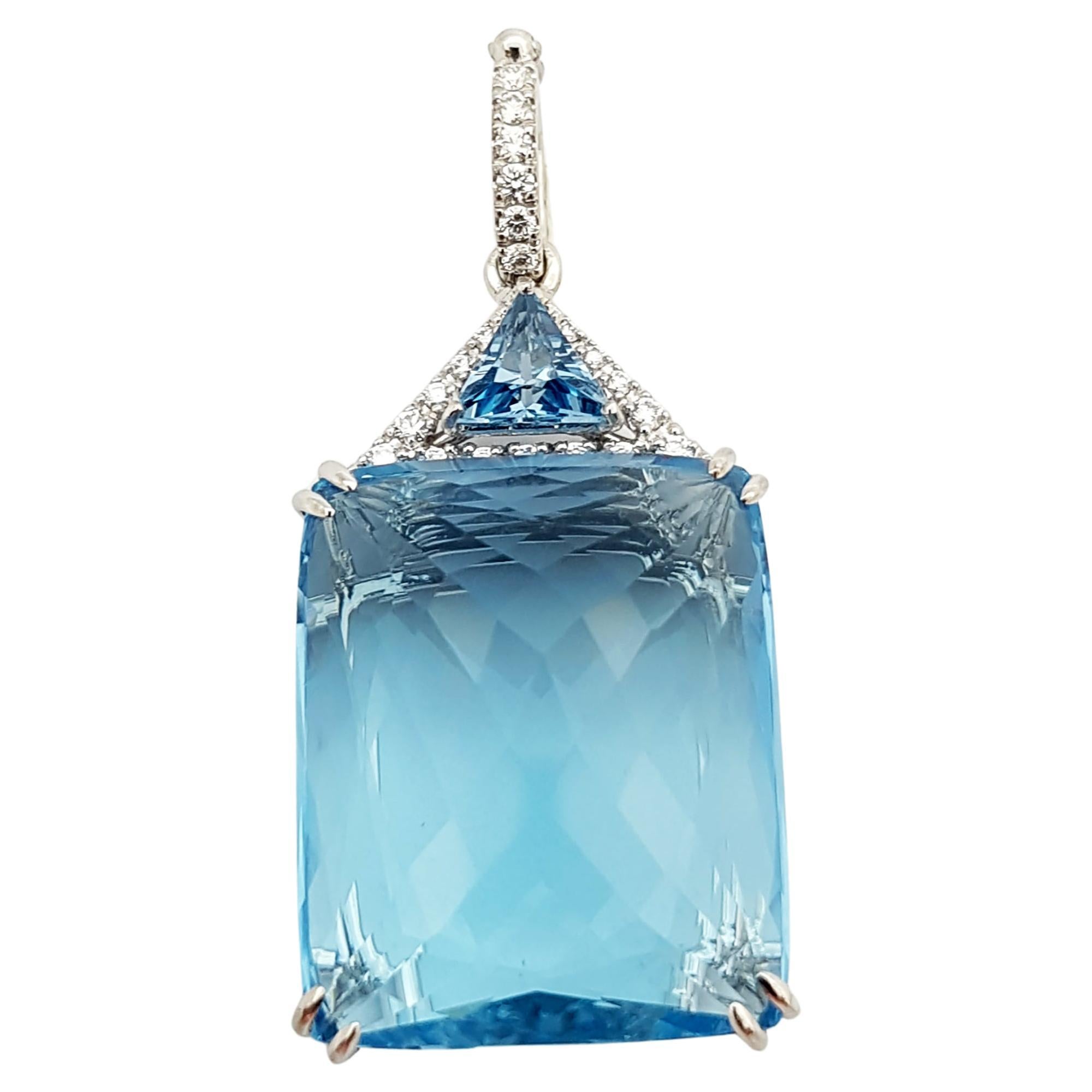 Blue Topaz and Diamond Pendant Set in 18 Karat White Gold Settings For Sale