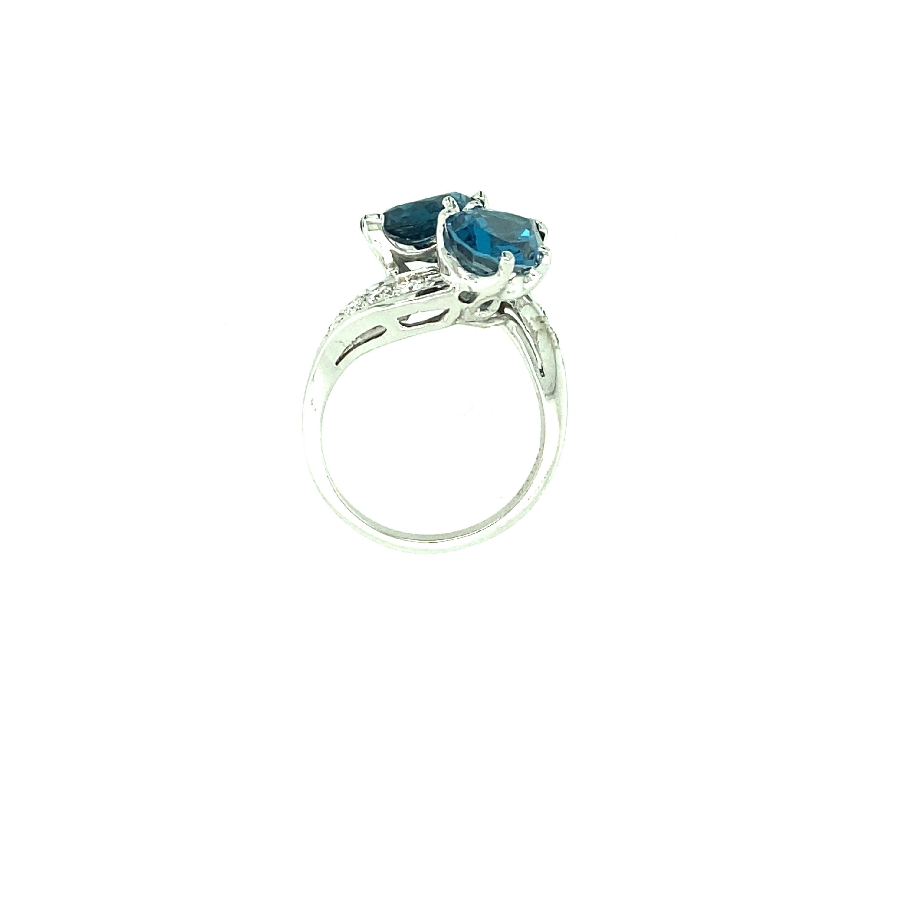 Contemporary Blue Topaz and Diamond Ring