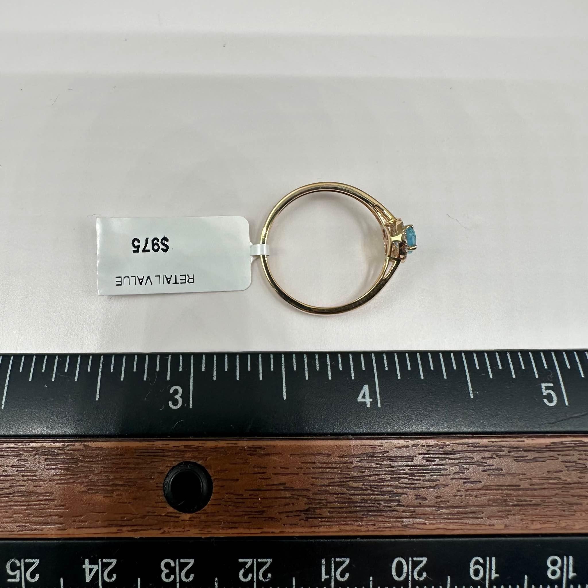 Bague en or jaune 14 carats, topaze bleue de 6 x 4 mm, diamants de 0,09 carat Pour femmes en vente