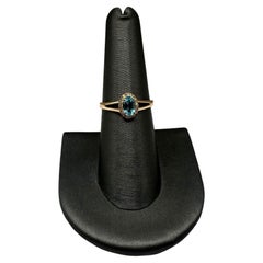 Bague en or jaune 14 carats, topaze bleue de 6 x 4 mm, diamants de 0,09 carat