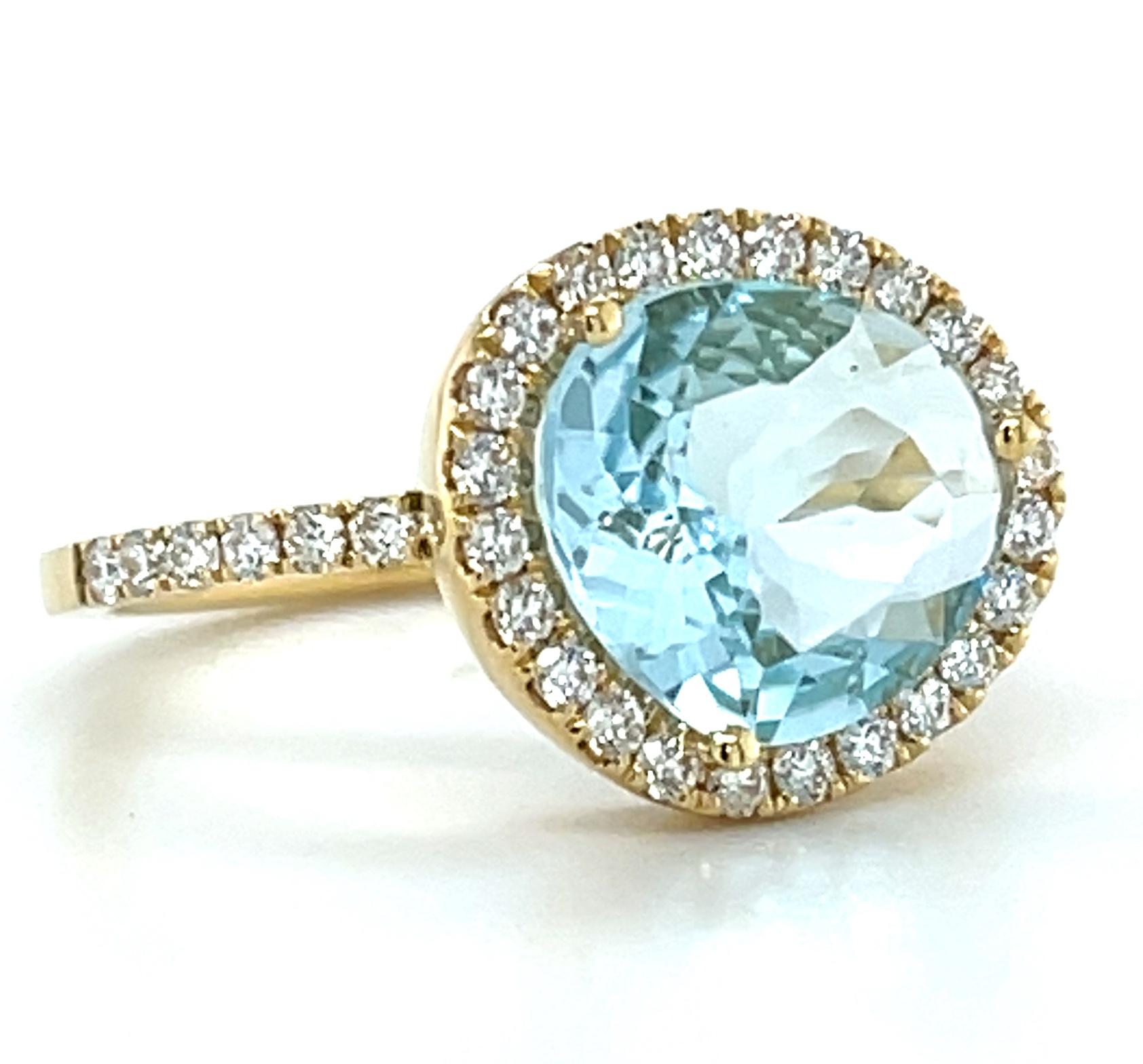 Artisan Bague en or jaune 18k avec topaze bleue et diamant en vente