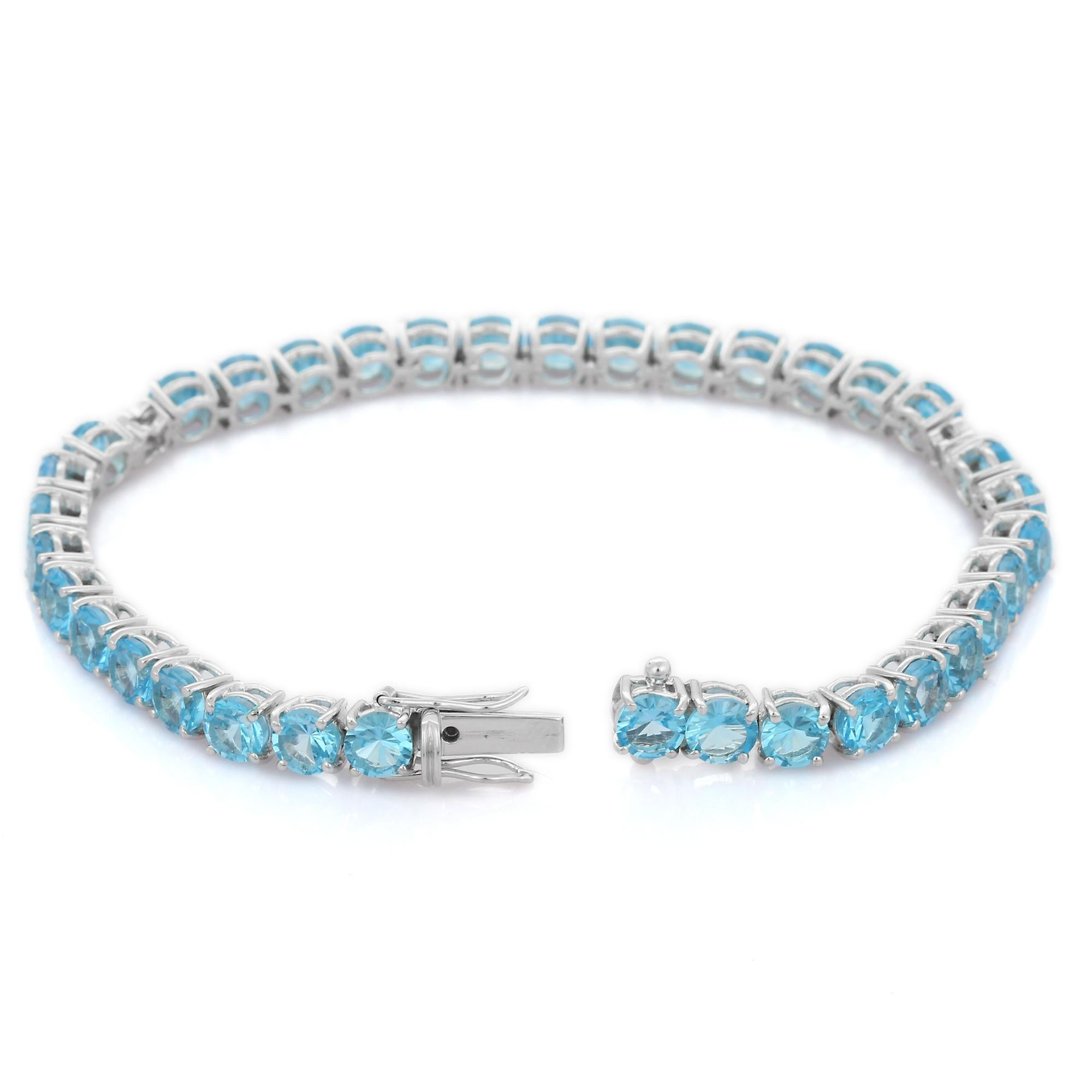Round Cut Blue Topaz and Diamond Tennis Bracelet in 18K White Gold