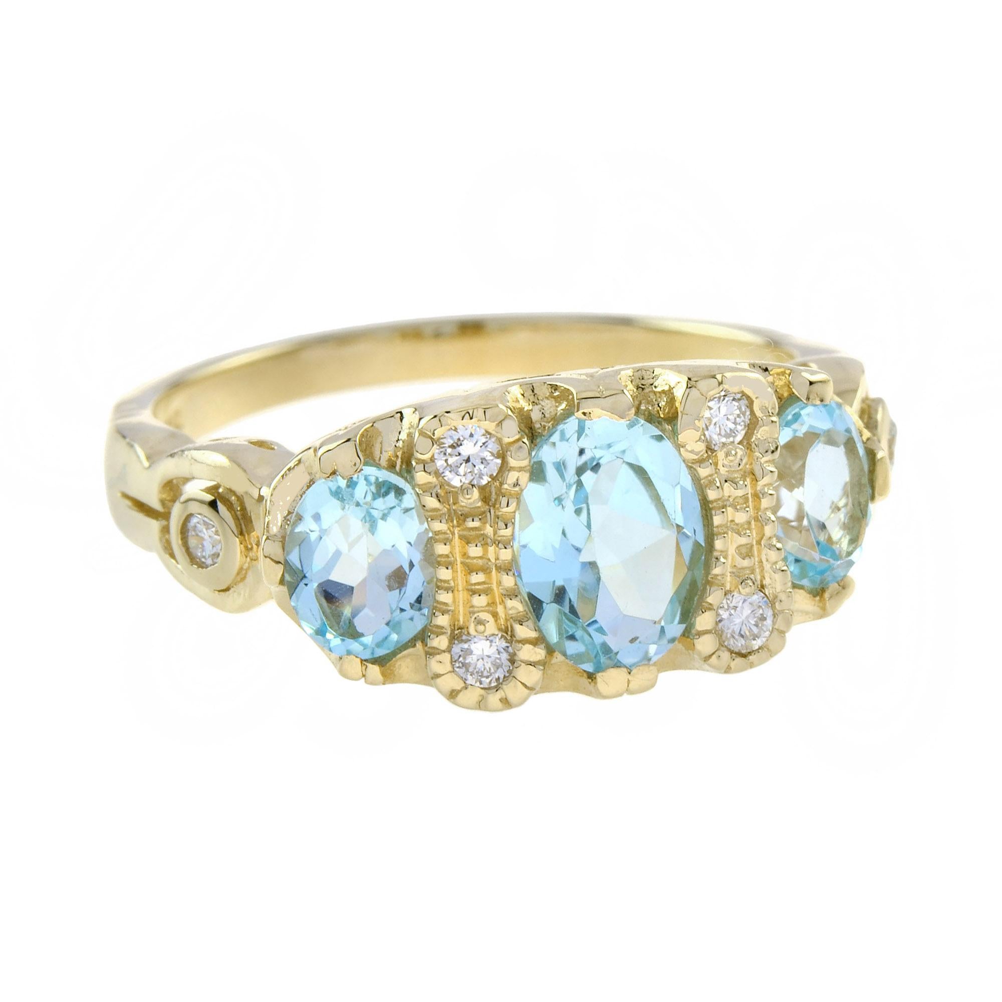 Im Angebot: Dreisteinring aus 9 Karat Gelbgold mit blauem Topas und Diamant im Vintage-Stil () 3