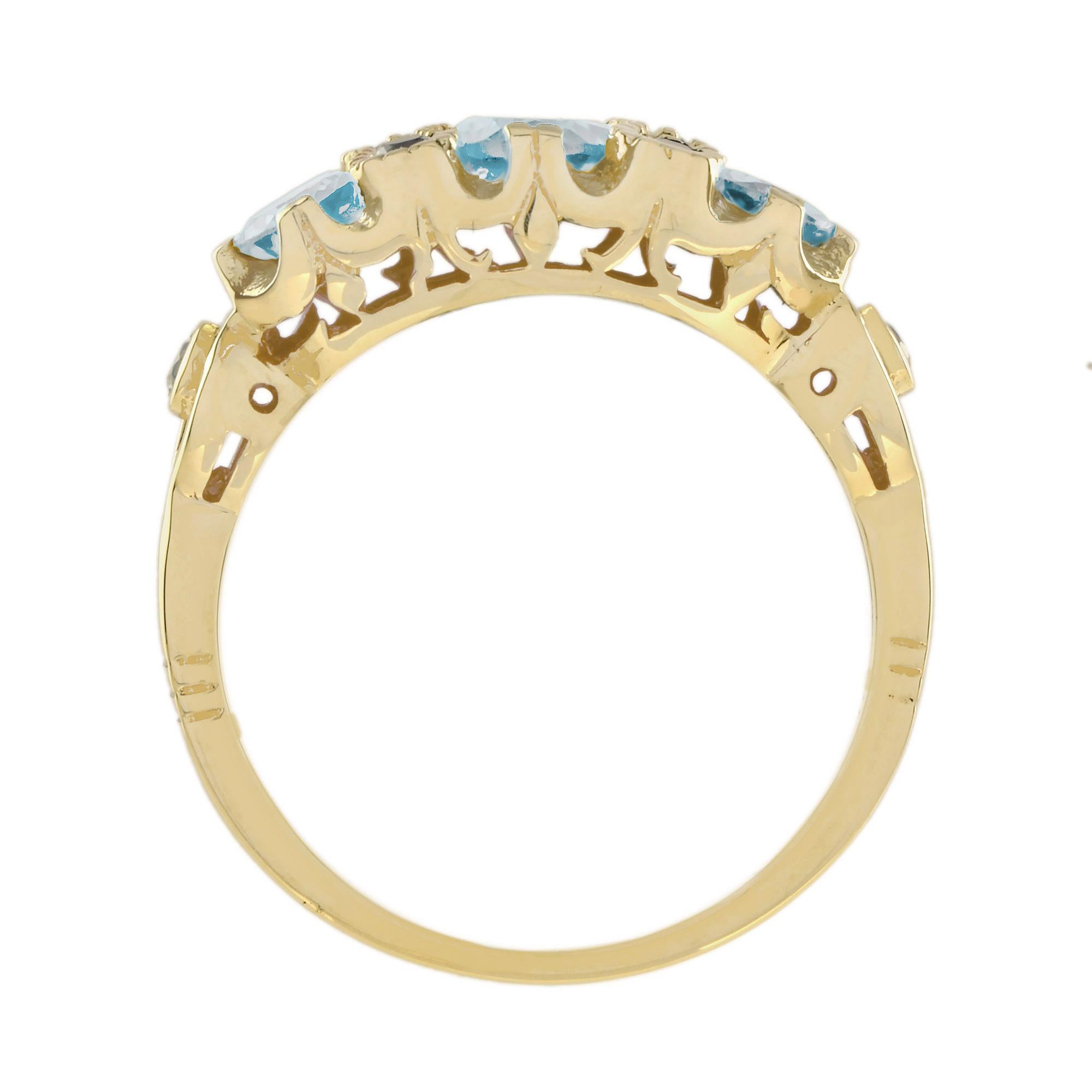 Im Angebot: Dreisteinring aus 9 Karat Gelbgold mit blauem Topas und Diamant im Vintage-Stil () 6