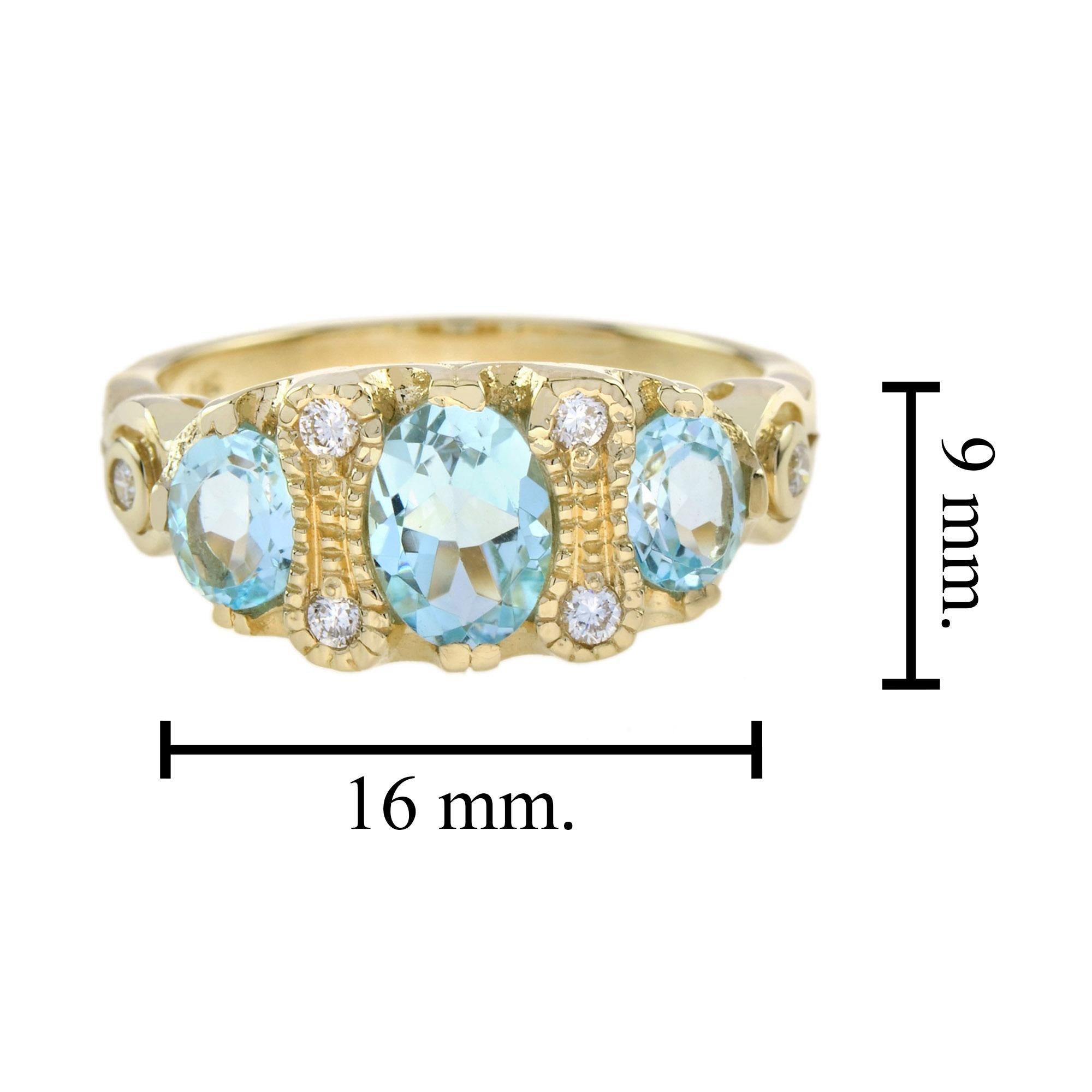 For Sale:  Blue Topaz and Diamond Vintage Style Three Stone Ring in 9K Yellow Gold 7