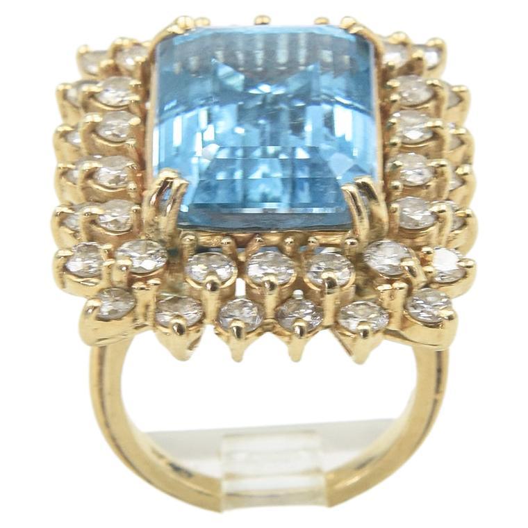 Emerald Cut Blue Topaz and Diamond Yellow Gold Cocktail Ring For Sale