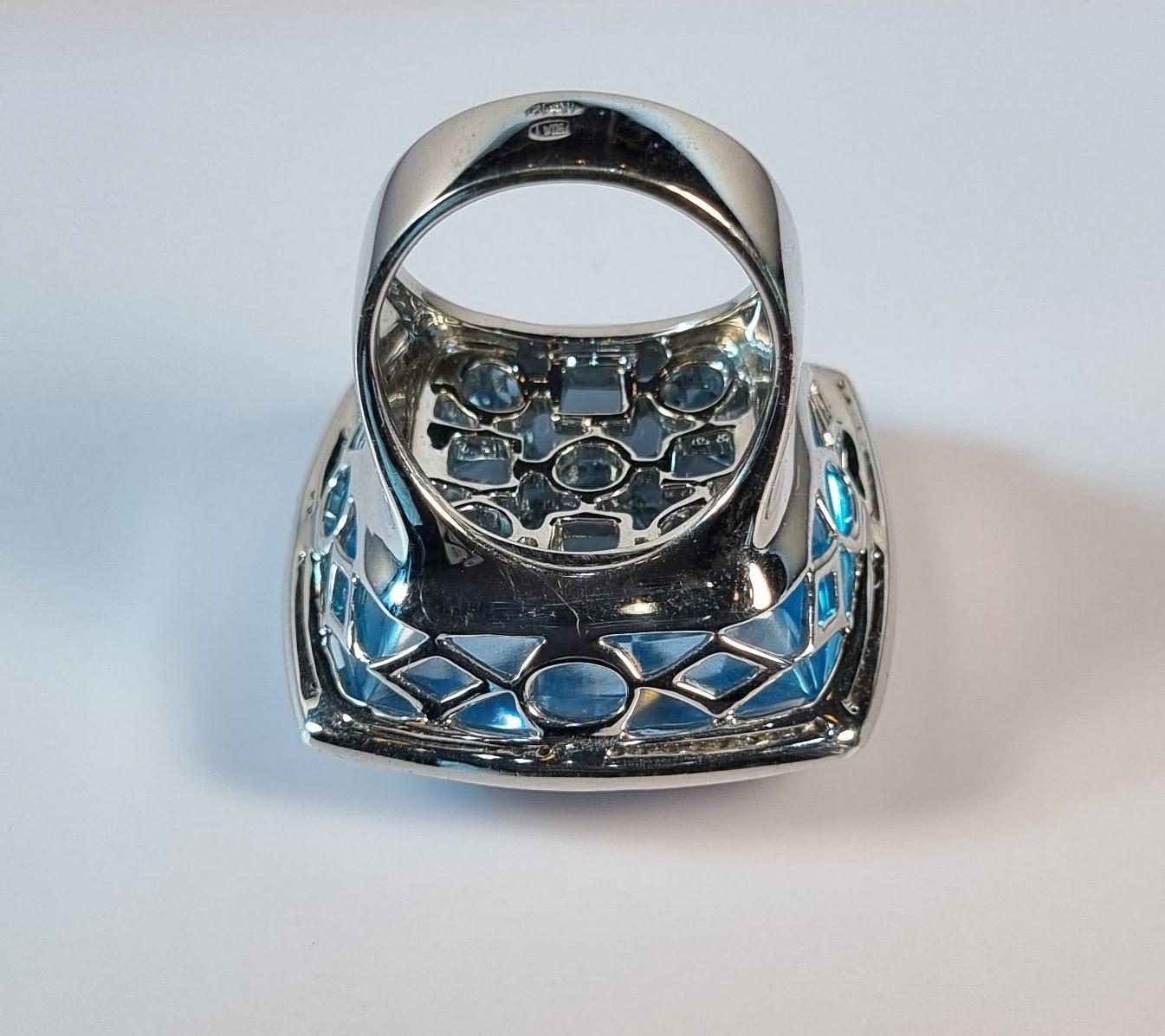 Women's Blue Topaz and Geometry of Diamonds in 18k White Gold Ring For Sale