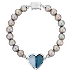 Blue Topaz and Grey Pearl Lover Boy Bracelet in 18 Karat White Gold