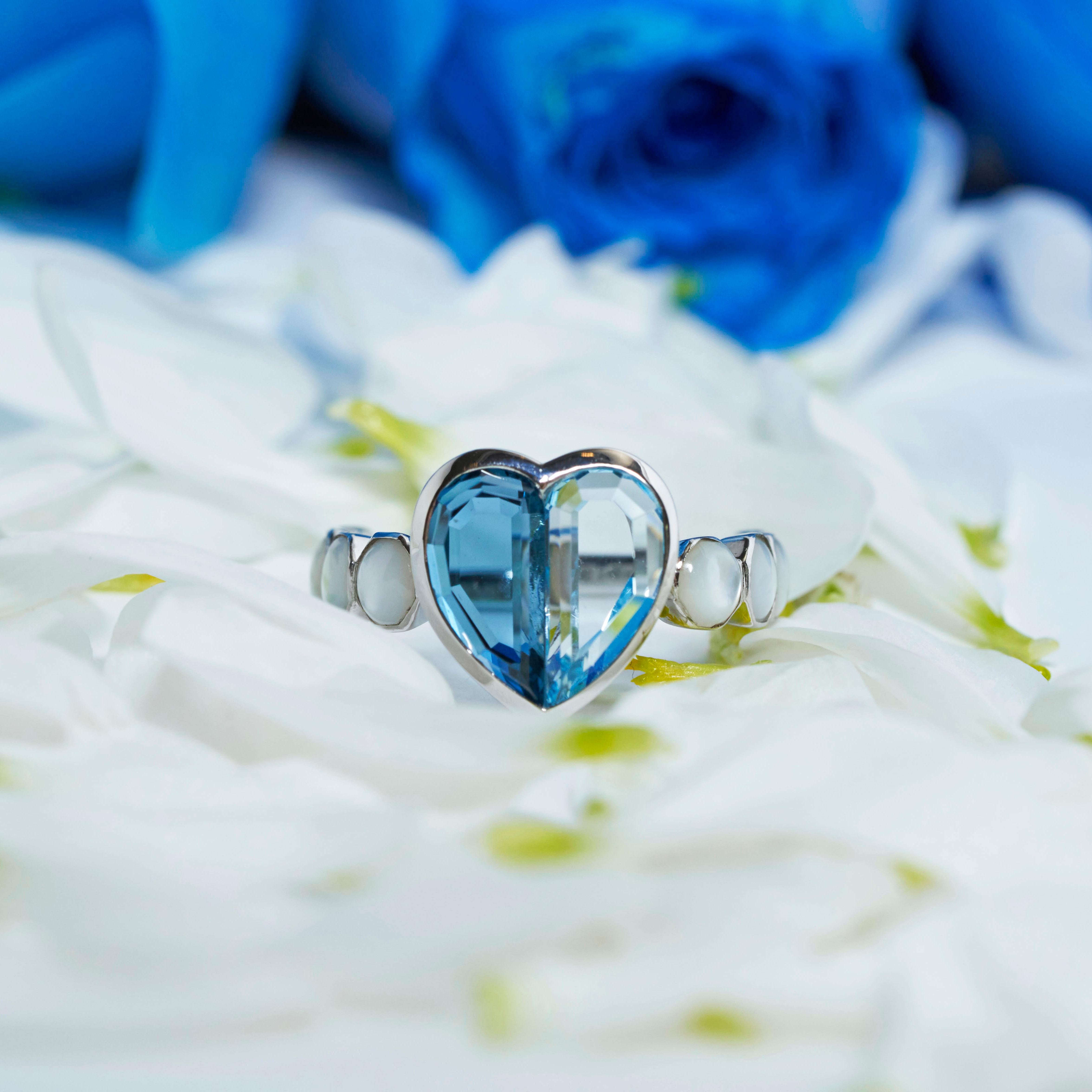 For Sale:  Blue Topaz and Mother of Pearl Love Ring V1 in 18 Karat White Gold 6