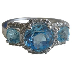 Ring aus 14 Karat Weißgold mit blauem Topas und natürlichem Diamant Größe 7