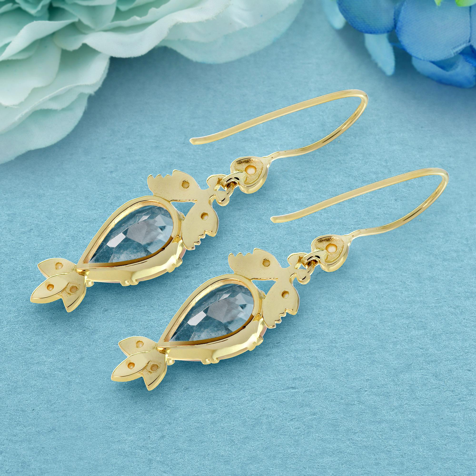 Pendientes de gota estilo vintage de topacio azul y perla en oro amarillo de 9 quilates Corte redondo en venta