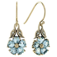 Orecchini in stile vintage con topazio blu e perle in oro giallo massiccio 9 carati