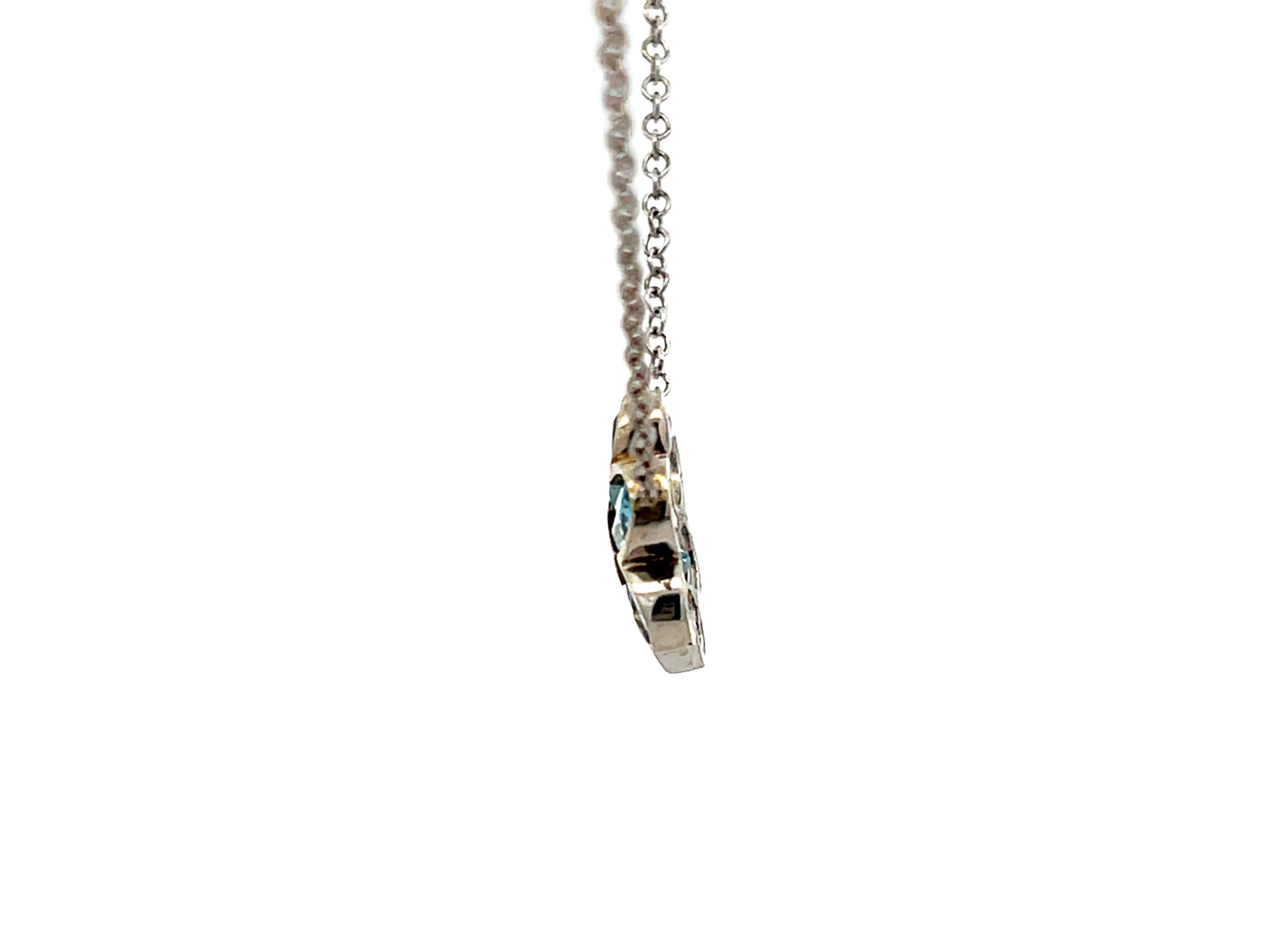 Modern Blue Topaz and Pink Tourmaline Flower Necklace in 14k White Gold For Sale
