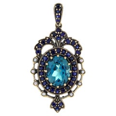 Blue Topaz and Sapphire Crown Pendant  in 9K Yellow Gold