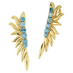 Blue Topaz and Yellow Gold Flame Earrings