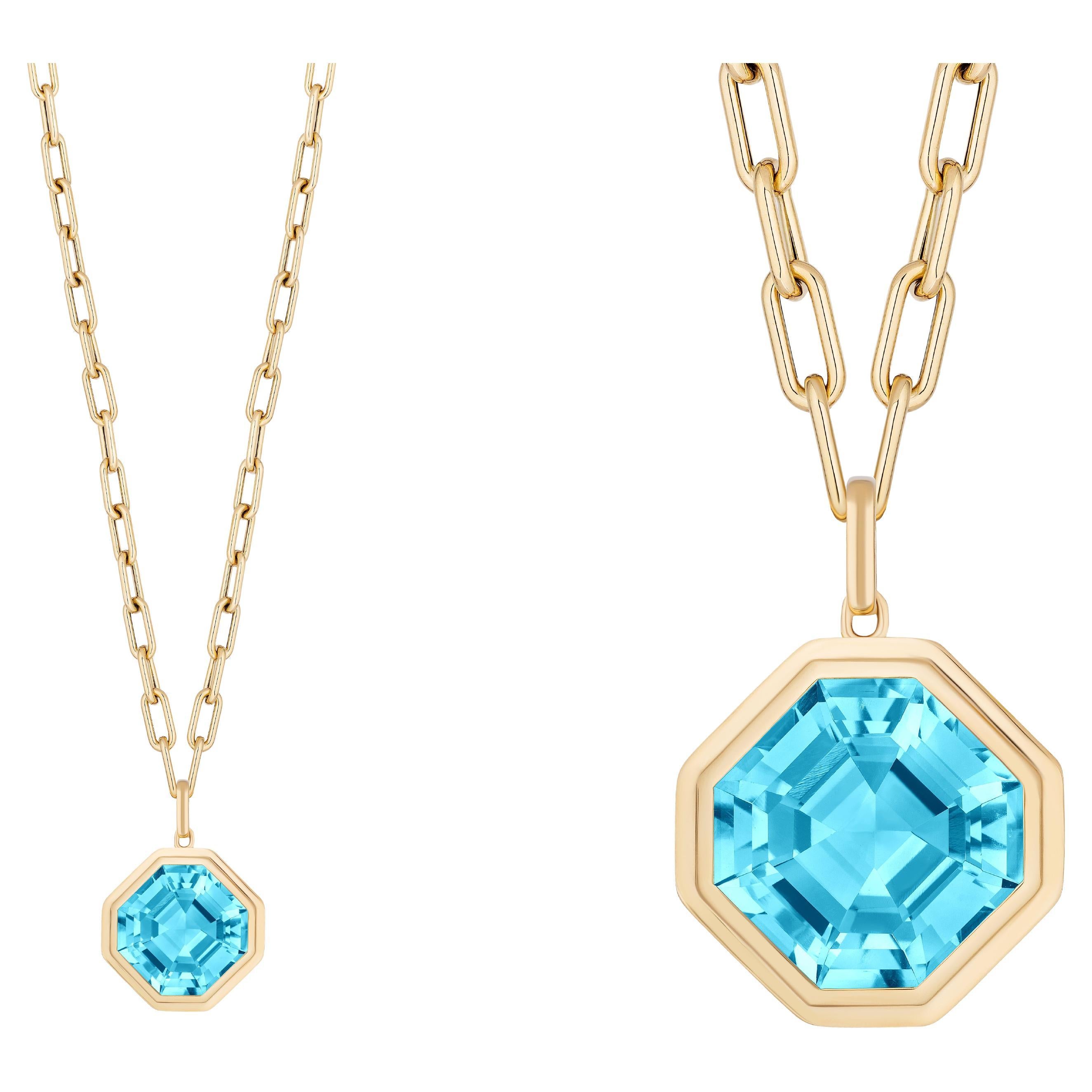 Blue Topaz Asscher Cut Bezel Set Pendant In 18K Yellow Gold