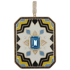 Pendentif en or 14 carats avec topaze bleue, saphir bleu et émail clouté