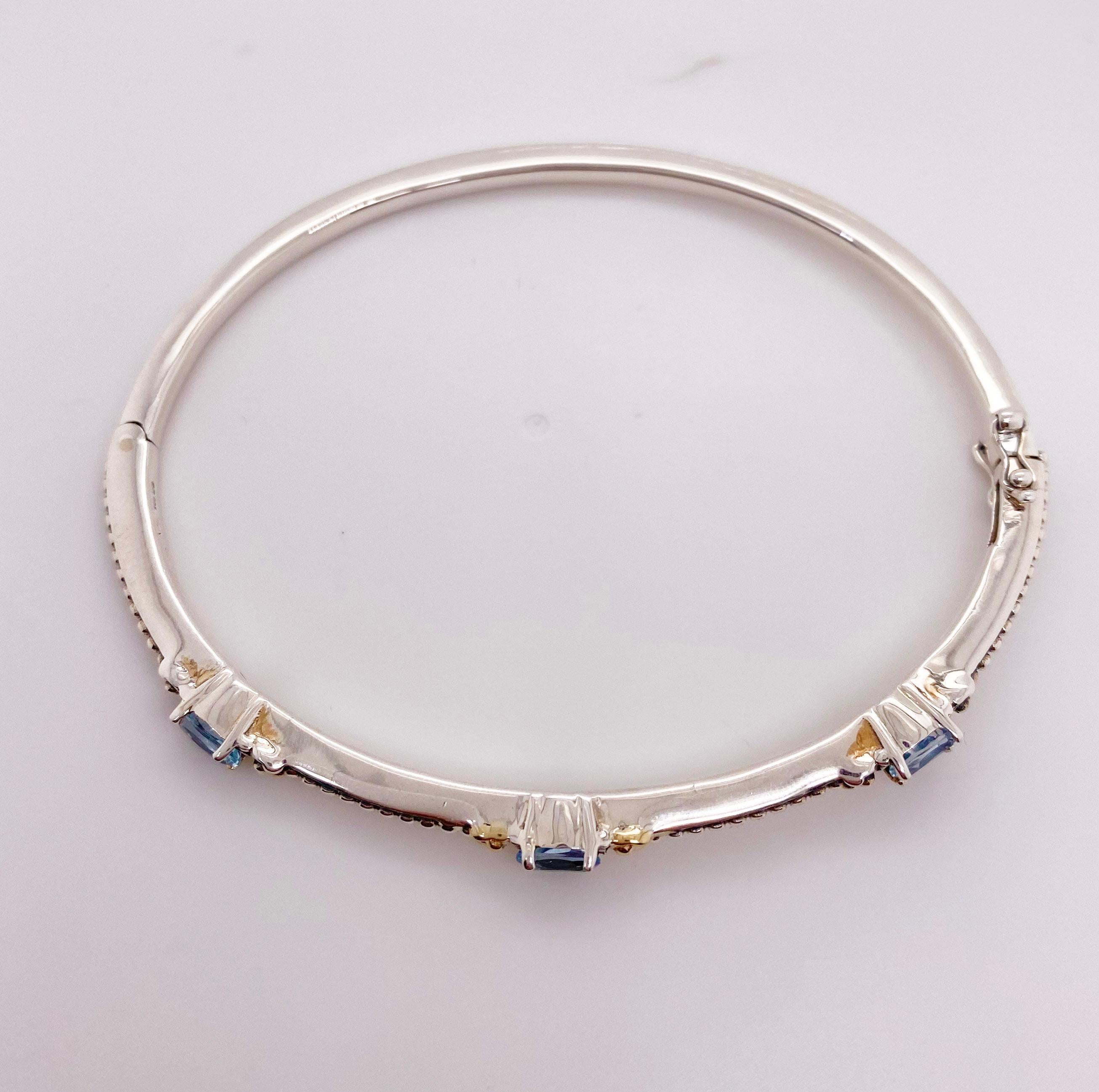 This bangle bracelet in mixed metals is a nice addition to any jewelry wardrobe. It looks great with other sterling or white gold items but can also mix with your yellow gold jewelry.  The beading detail and design of the bracelet is very becoming