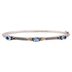 Blue Topaz Bracelet Mixed Metal Bangle and Bead Accents