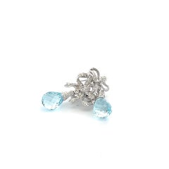 Blue Topaz Briolette And Diamond Bow Earrings in 18 Karat White Gold