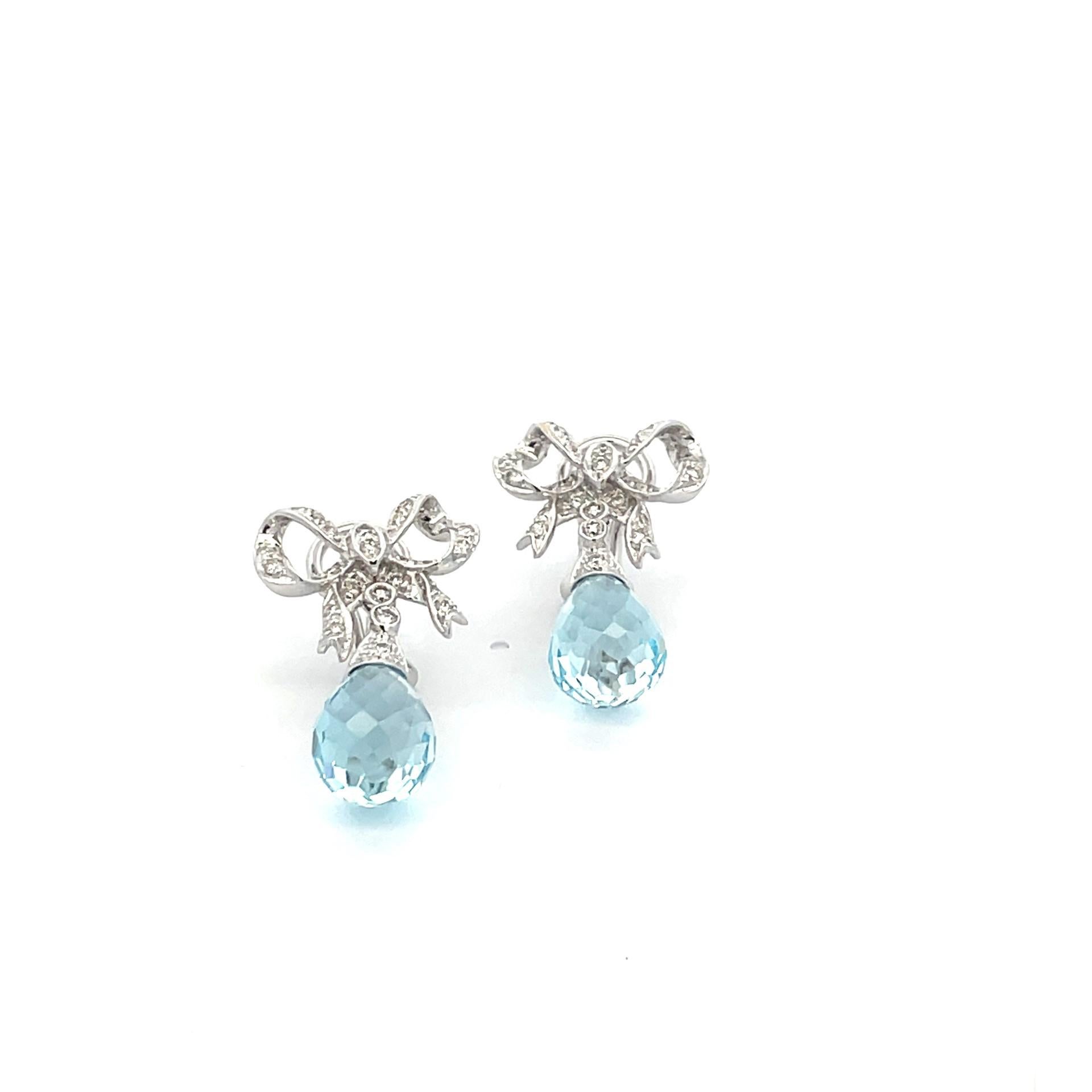Contemporary Blue Topaz Briolette And Diamond Bow Earrings in 18 Karat White Gold For Sale