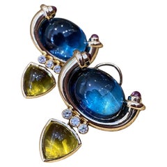 Blue Topaz Cabochon and Diamond Earrings in 18k Yellow Gold