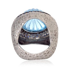 Anello scolpito in topazio blu con zaffiro e diamanti in oro e argento 14 carati