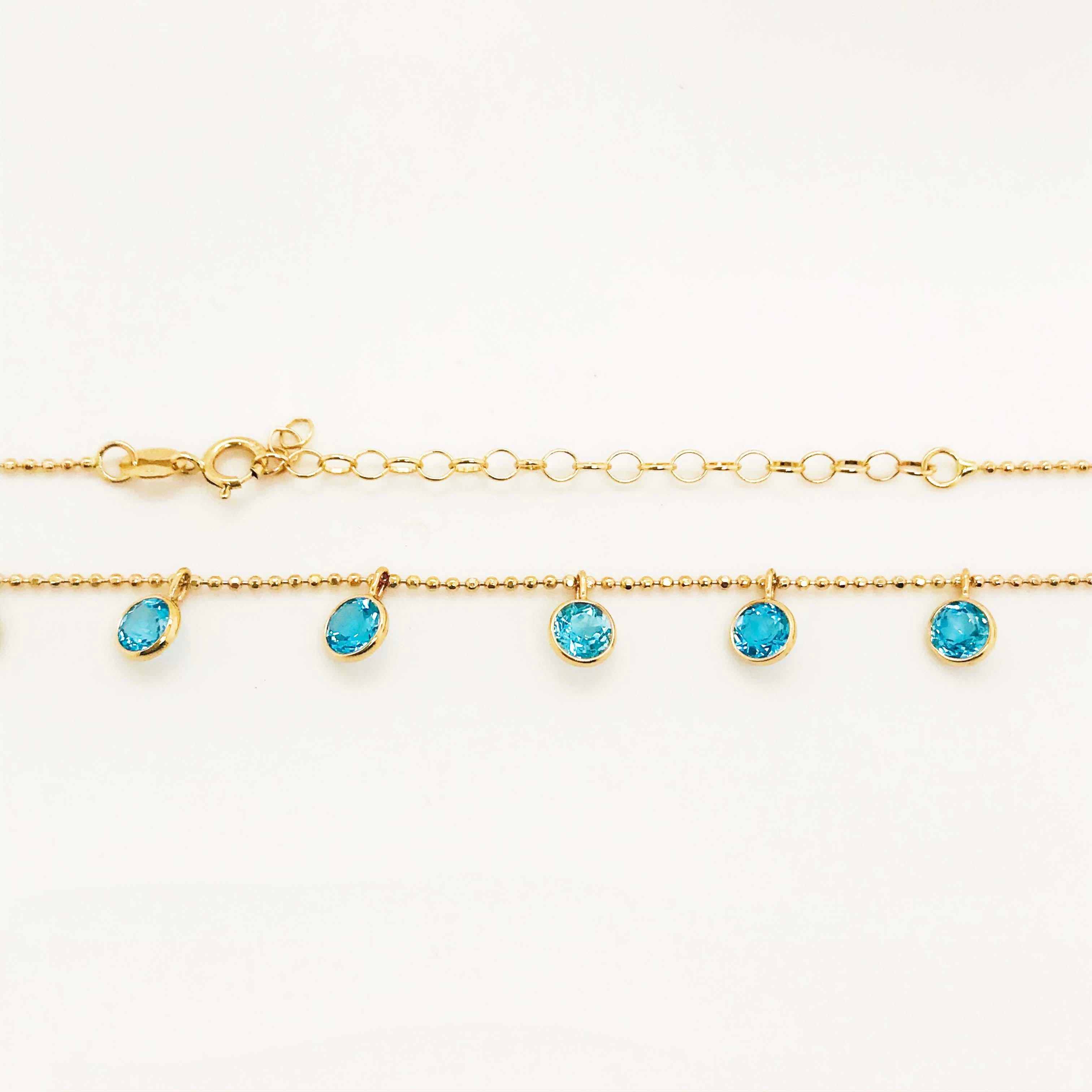 Blue Topaz Charm Necklace 14K Yellow Gold 2.25 Carat Round Topaz Gemstones In New Condition In Austin, TX