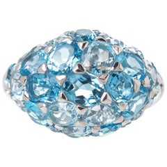 Blue Topaz Cluster Dome Ring 7.13 Carat Set in 18 Karat White Gold