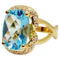 Blue topaz cushion checkerboard ring. 7.60cts Blue topaz cushion checkerboard ring. 7.60cts