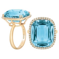 Blautopas Ring im Kissenschliff mit Röhrenschaft und Diamant in 18K Gelbgold