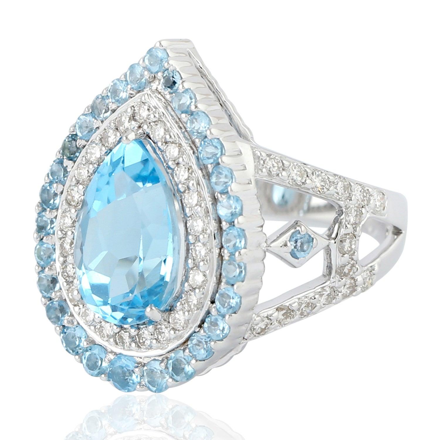 En vente :  Bague en or 18 carats avec topaze bleue et diamants 3