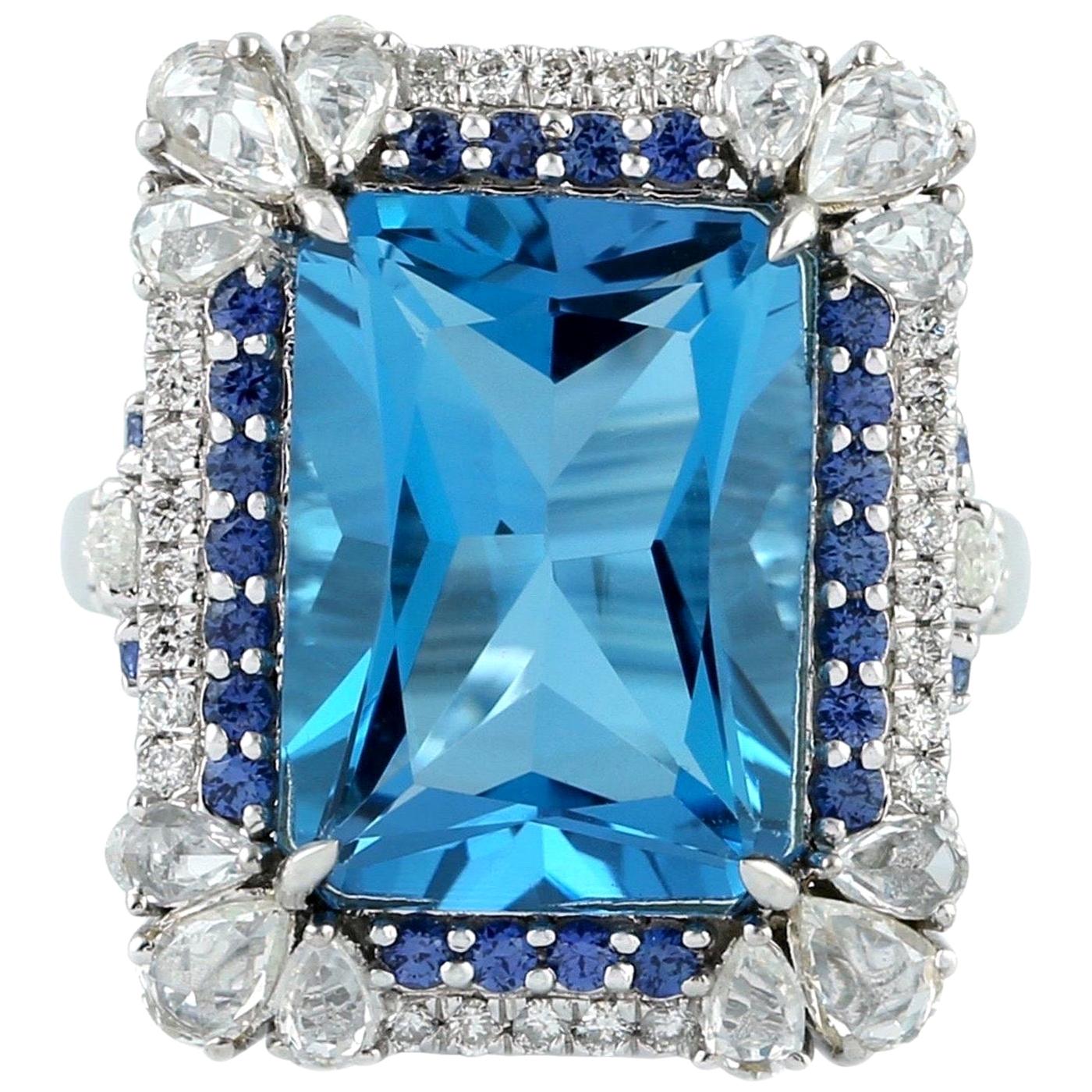 Bague en or 18 carats avec topaze bleue et diamants