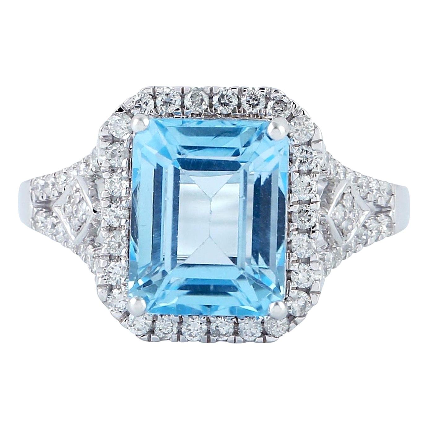 En vente :  Bague en or 18 carats avec topaze bleue et diamant