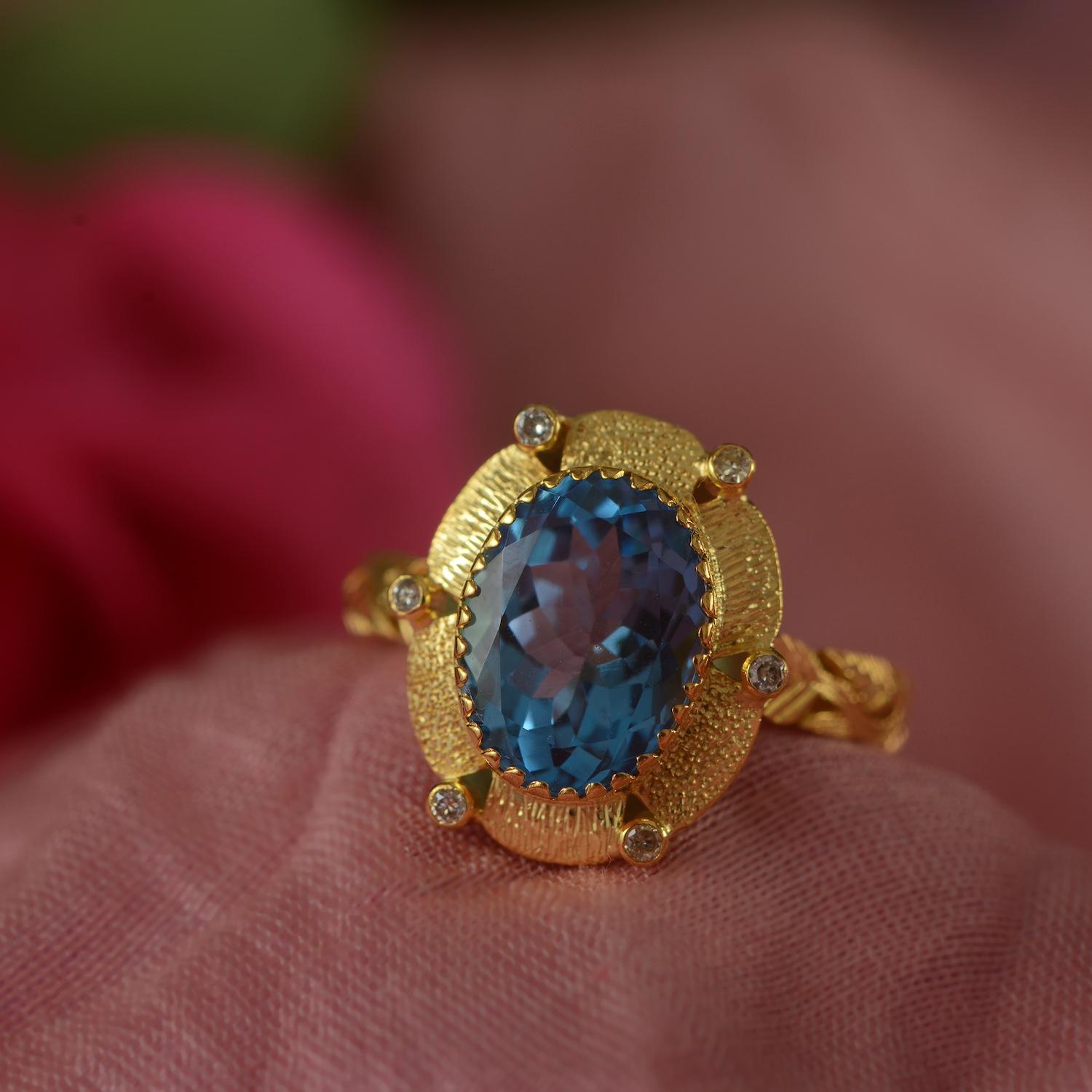 Contemporary Blue Topaz Diamond 18k Gold Cocktail Ring For Sale