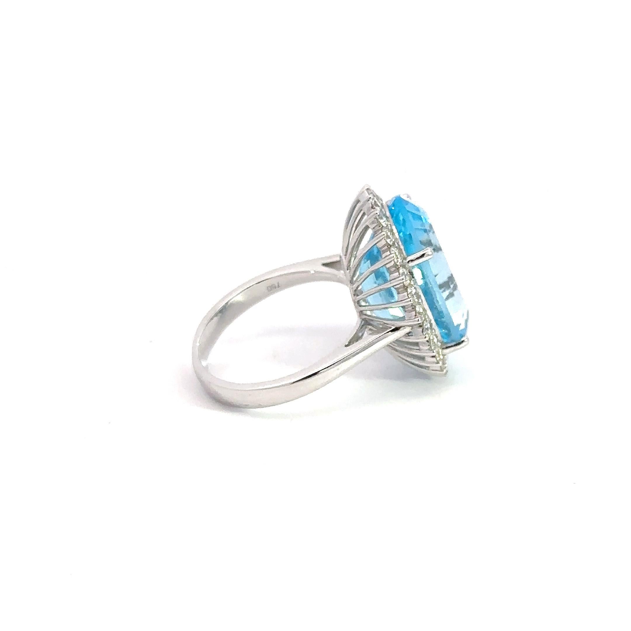 Exklusiver Ring aus 18 Karat Weißgold mit blauem Topas und Diamant für sie Damen im Angebot